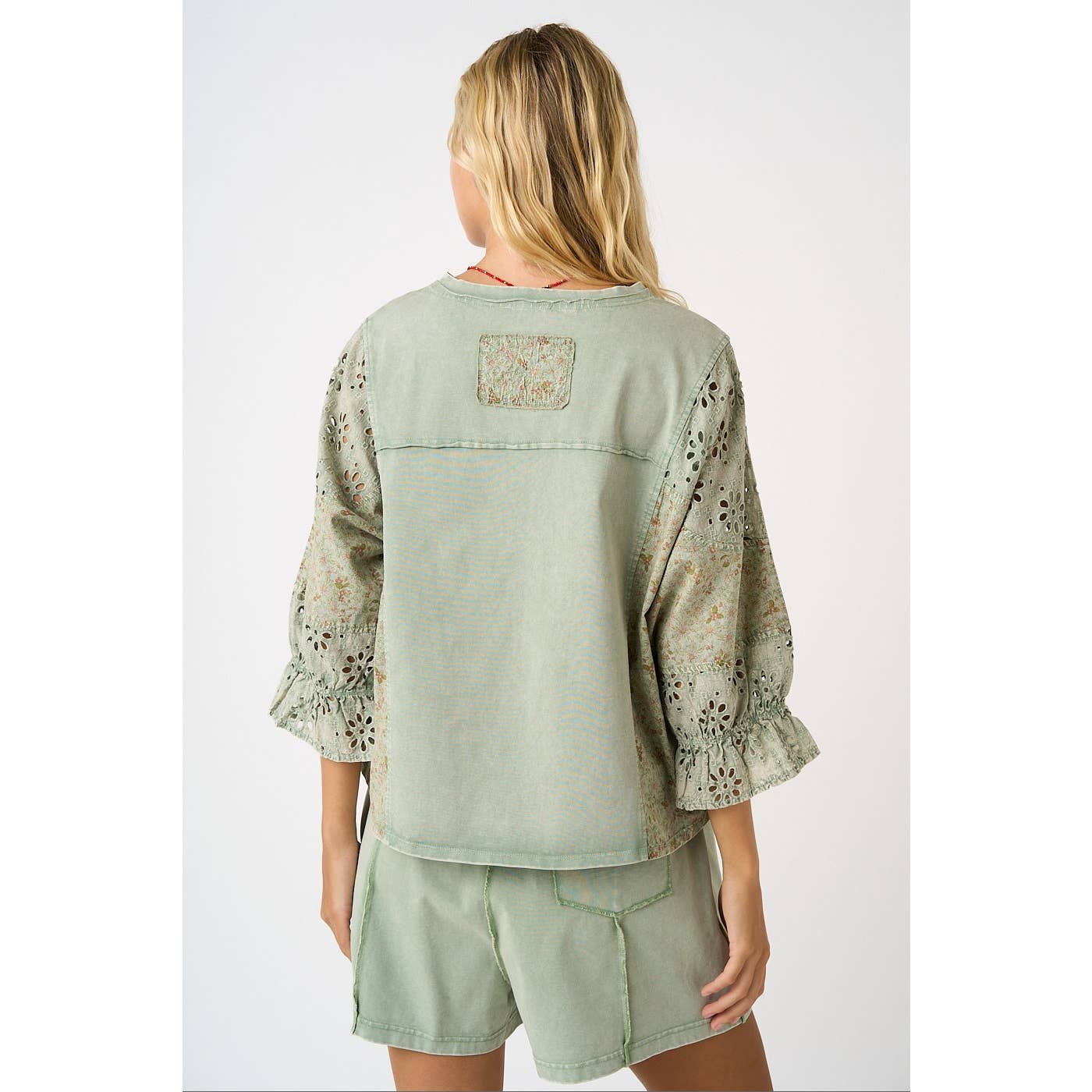 EYELET PATCHWORK RUFFLE LONG SLEEVE TOP